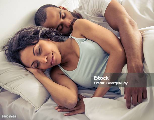 Afro American Couple Stock Photo - Download Image Now - Couple - Relationship, Bed - Furniture, Sleeping