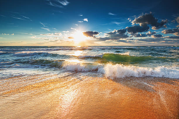 istock Sunrise with beautiful cloudscape over the sea 598061988