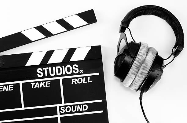 istock Slate film and headphone white backgroun 598062290