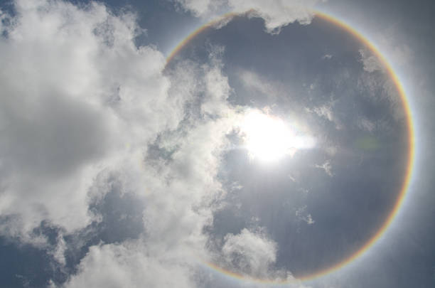 istock Sun with circular rainbow  sun halo occurring due 598062416