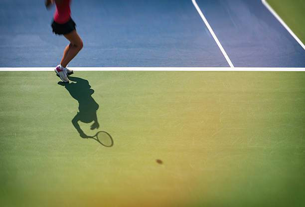 istock Tennis serve silhouette 598063634