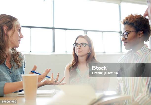 Unposed Group Of Adult Student In An Open Concept Class Stock Photo - Download Image Now