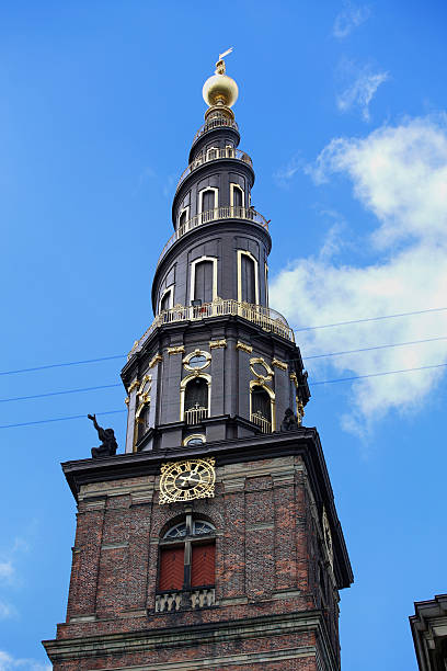 View of the Vor Frelsers Kirke Tower in Copenhagen, Denmark stock photo