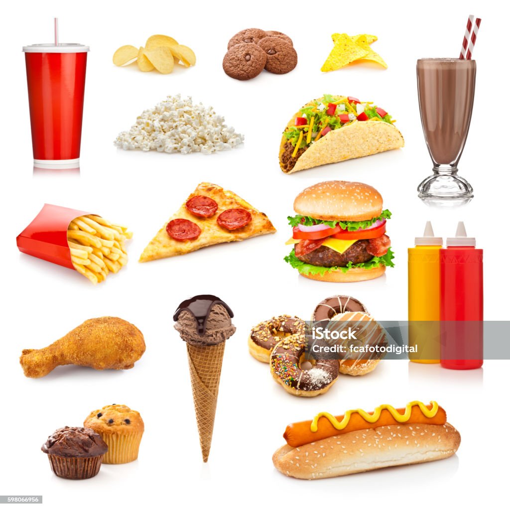 Unhealthy food isolated on white background Large group of unhealthy food isolated on white background. The composition includes, soda, potato chips, cookies, nachos, fries, pizza slice, popcorn, chocolate milkshake, taco, cheeseburger, fried chicken leg, ice cream, donuts, ketchup and mustard, muffins and a hotdog. This is an unhealthy food rich in carbohydrates, sugar and calories. Cut Out Stock Photo
