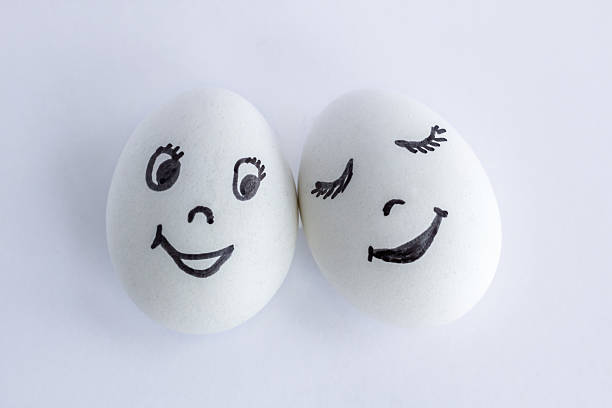 istock Funny eggs imitating a happy couple of smiling lovers 598069766