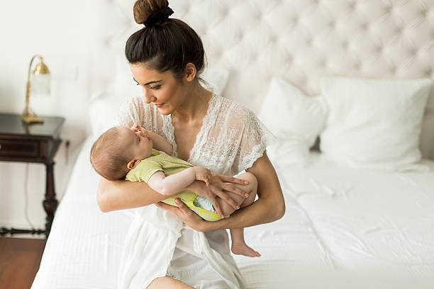 istock Happy mother with baby 598069774