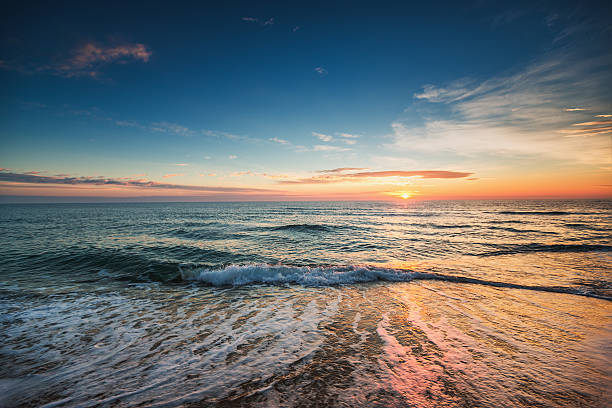 istock Beautiful sunrise over the sea 598077228