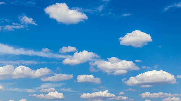 istock Cumulus clouds are piled domes on the blue sky. 598077758