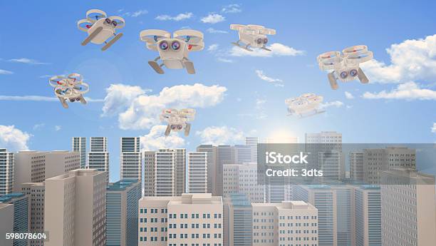 Surveillance Drones Flying Over The City Stock Photo - Download Image Now - Aerial View, Air Vehicle, Camera - Photographic Equipment