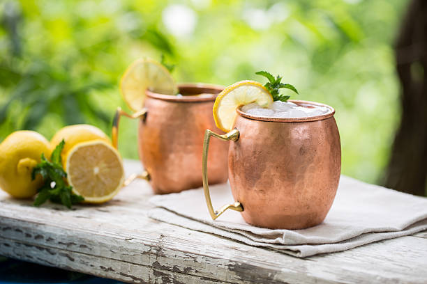 istock Moscow mules cocktail in copper mugs 598079978