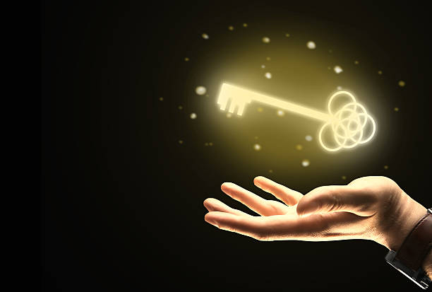 istock Businessman hand holding golden key 598080058