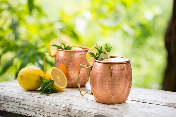istock Moscow mules cocktail in copper mugs 598080128