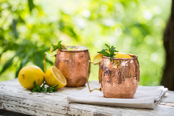 istock Moscow mules cocktail in copper mugs 598080226