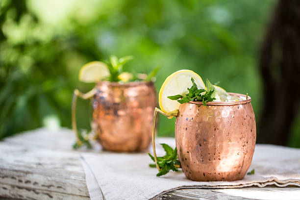 istock Moscow mules cocktail in copper mugs 598080360