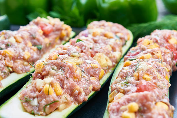istock Raw courgettes stuffed with meat and vegetables 598081780