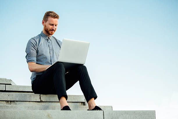 istock Young businessman working outdoor 598082712