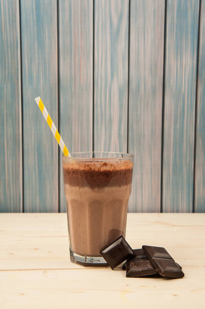 istock Chocolate Milkshake on wooden table 598082714