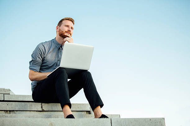 Young businessman working outdoor