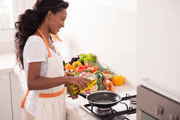 istock Woman making vegetarian dinner. 598082750
