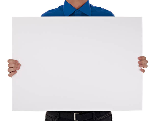 istock man in shirt holding blank sign 598083624