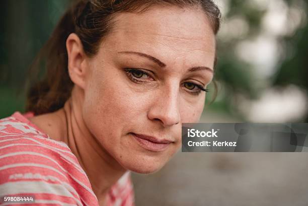 Portrait Of Sad Woman Stock Photo - Download Image Now - Women, One Woman Only, Serious