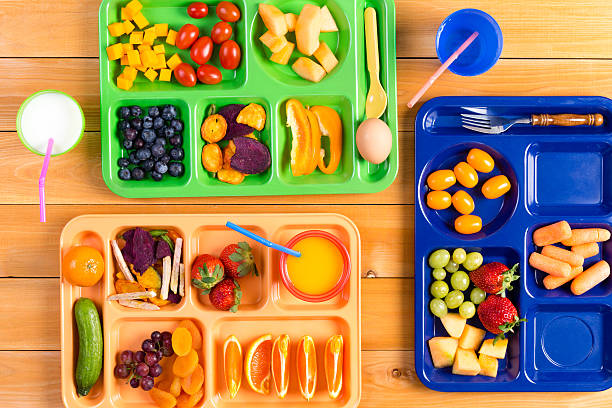 istock Lunch trays with food and drinks 598085168