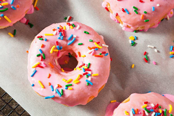 istock Homemade Sweet Donuts with Pink Frosting 598085484