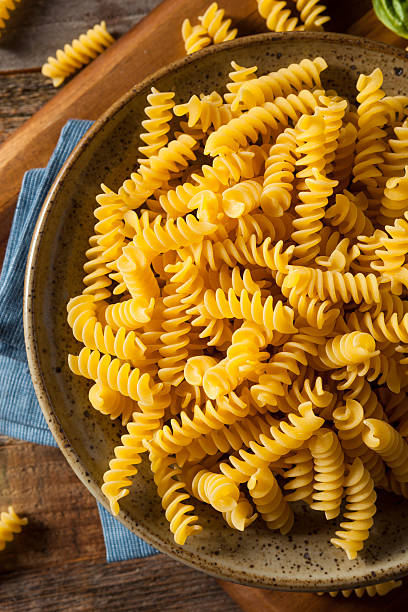 istock Raw Dry Organic Fusilli Pasta 598085650