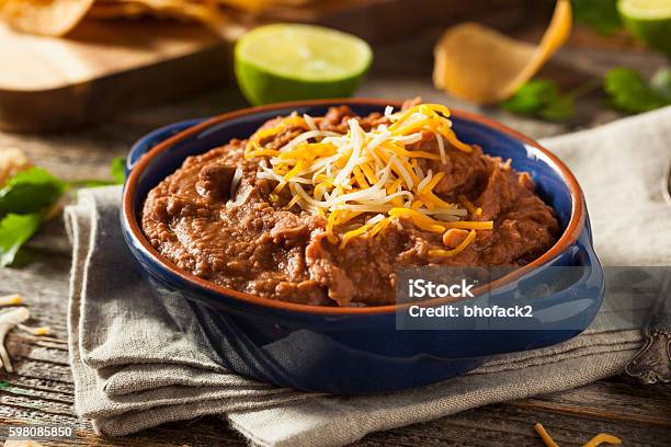 Homemade Refried Pinto Beans Stock Photo - Download Image Now - Bean, Refried, Dipping Sauce