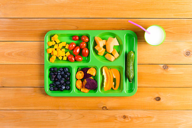 istock Single green lunch tray of fruit 598086388
