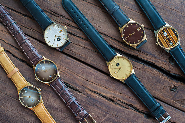istock Vintage Wrist watches on a wooden table 598087586