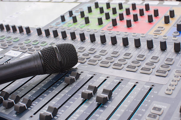 istock Music equipment,microphone on audio mixer 598091680