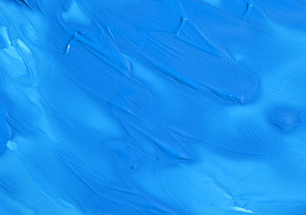 monochromatyczne niebieskie tło z rozmazami farb - stroke paint stroking textured zdjęcia i obrazy z banku zdjęć