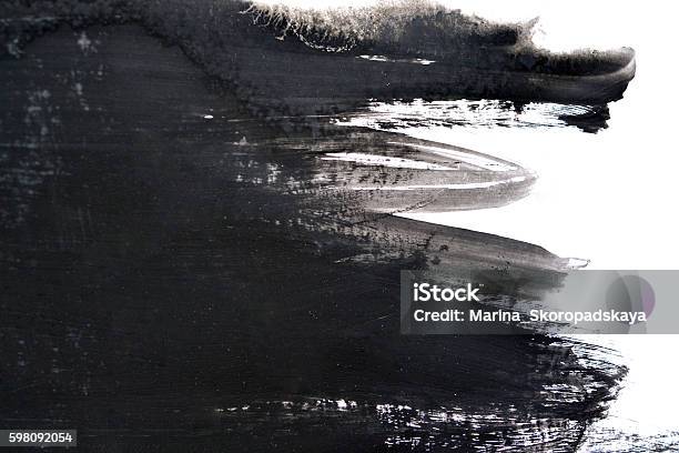 Black Brush Strokes On White Paper Stock Photo - Download Image Now - Black Color, Abstract, Brush Stroke
