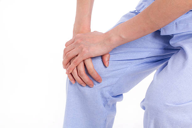 istock woman suffering from knee joint pain, arthritis, gout 598092948