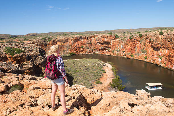 istock Young Woman Outback River Australia 598096760