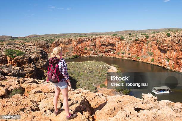Young Woman Outback River Australia Stock Photo - Download Image Now - Exmouth - Western Australia, Western Australia, Hiking
