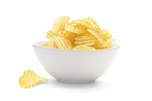 Homemade Spicy Potato Chips Table Top View Isolated on plain white Background.