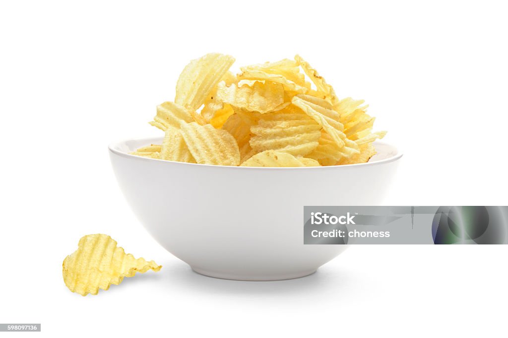 Potato chips Potato chips in the faience white bowl isolated Potato Chip Stock Photo