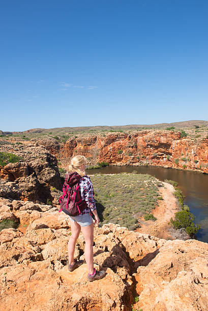 istock Young Woman Outback Cape Range Australia 598097792
