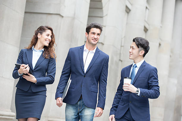 istock business people walk on road 598098420