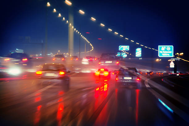 istock Abstract motion-blurred view from the front of a car 598131088
