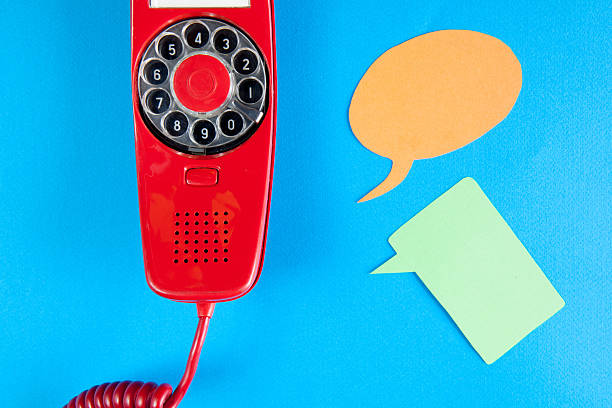 istock Vintage red phone and speech ballons 598132702