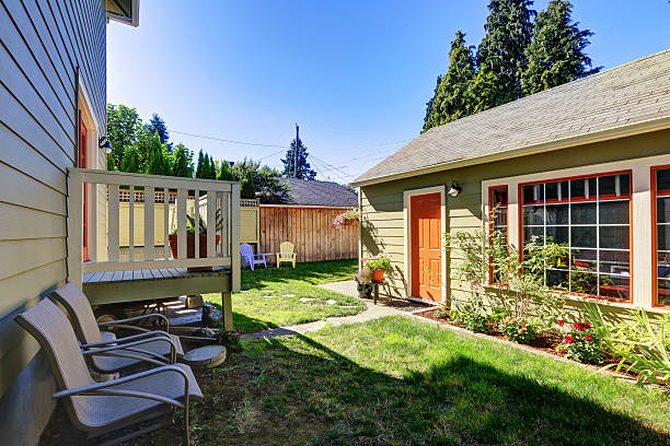 istock Backyard view of craftsman house with a shed 598133820