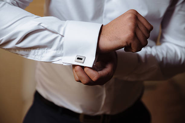 istock Businessman hands with cufflinks. Elegant gentleman clother 598133940