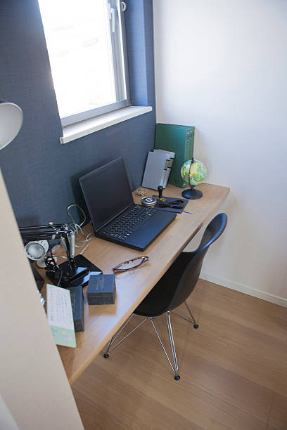 istock Desk with laptop and desk essentials 598135234