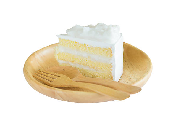 istock Coconut cake on wooden plate 598136444