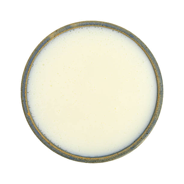 istock Bowl of buttermilk on a white background 598139198