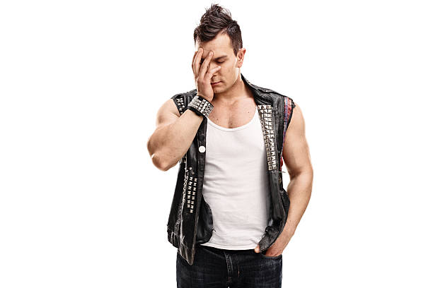 istock Punker holding his head in disbelief 598139270