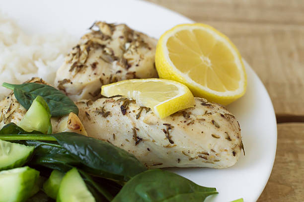 istock Fresh green salad, white chicken meat baked with thyme 598141054